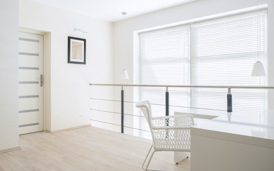 Loft with faux wood blinds